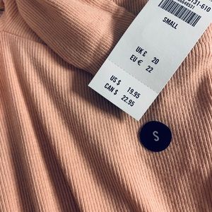 Pink bodysuit with cute bow